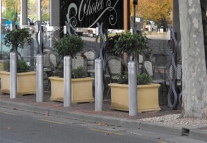 Steel energy absorbing bollard
